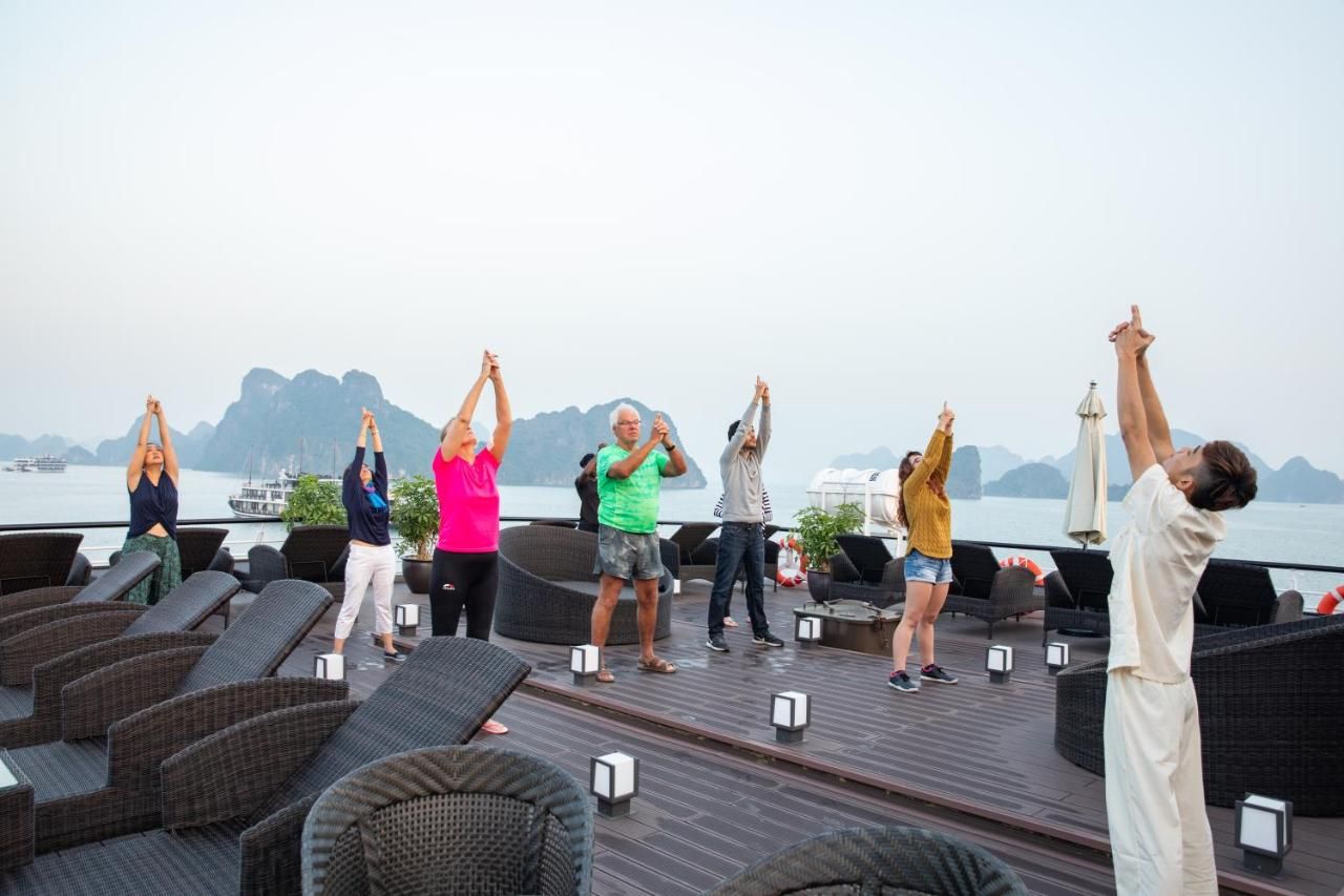 early morning Tai Chi sessions on the sundeck halong bay cruise